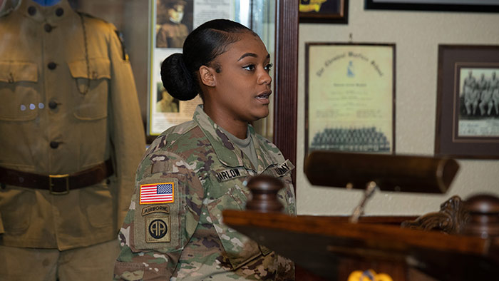 Soldier in uniform during commencement ceremony.